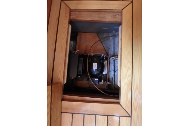 Si J'avais Su Yacht Photos Pics Wooden compartment with mechanical equipment inside a 2017 Custom Gilbert Caroff Lex Eterna 47.