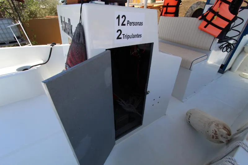  Yacht Photos Pics 2022 Grady-White Canyon 336 boat interior with seating and storage compartment.