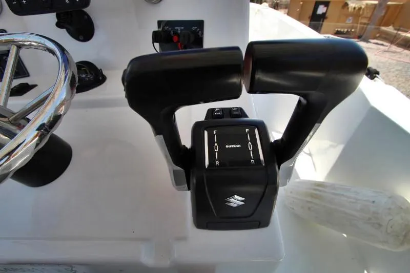  Yacht Photos Pics Throttle controls on 2022 Grady-White Canyon 336 boat dashboard.