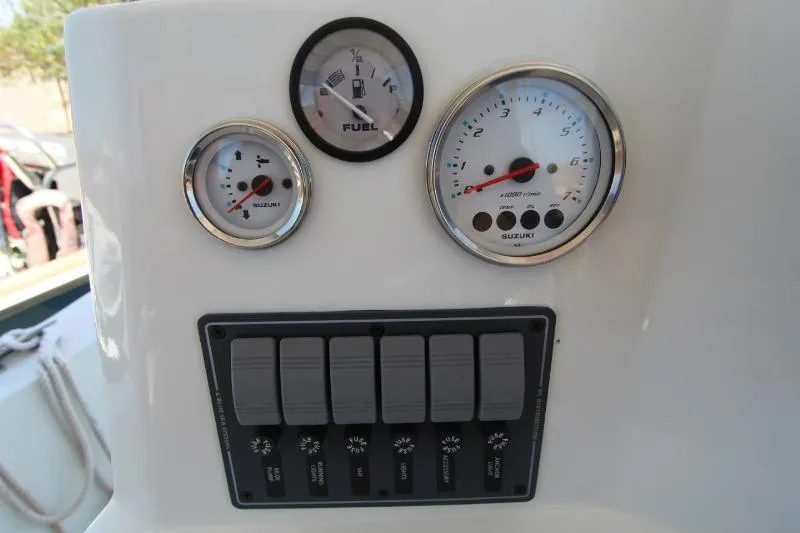  Yacht Photos Pics Dashboard of 2022 Grady-White Canyon 336 boat with gauges and switches.