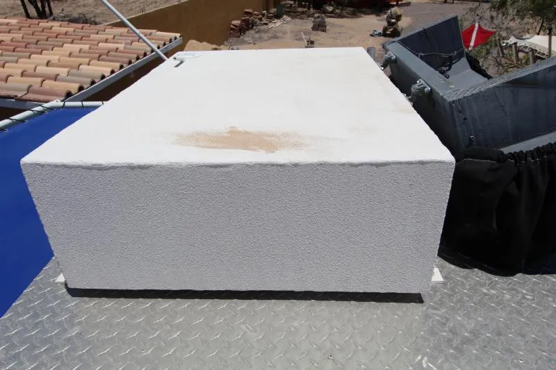  Yacht Photos Pics Rooftop view with a large white rectangular structure on a metal surface.