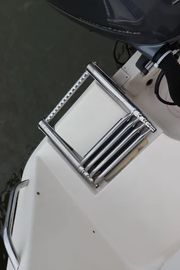  Yacht Photos Pics 2015 Grady-White Canyon 306 boat with stainless steel swim ladder.