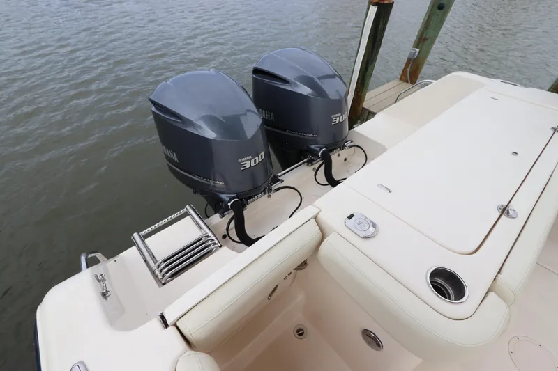  Yacht Photos Pics 2015 Grady-White Canyon 306 boat with twin 300 horsepower engines docked.