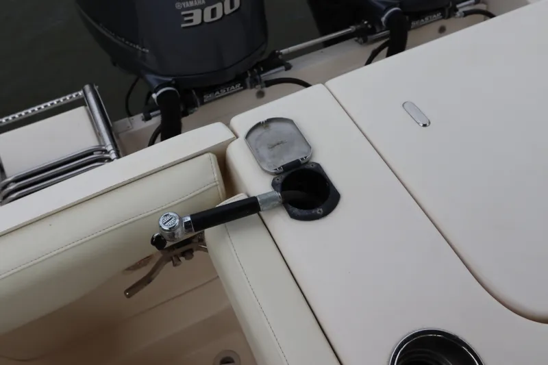  Yacht Photos Pics 2015 Grady-White Canyon 306 boat deck with rod holder and Yamaha 300 engine.