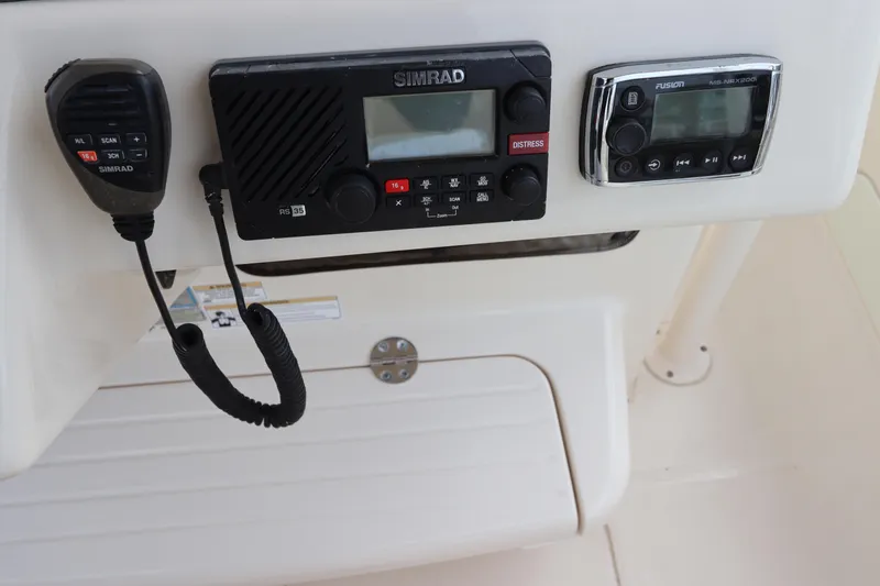  Yacht Photos Pics Control panel of a 2015 Grady-White Canyon 306 boat with communication devices.