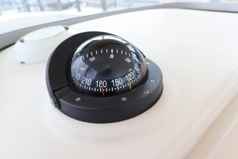  Yacht Photos Pics Compass on 2015 Grady-White Canyon 306 boat dashboard.
