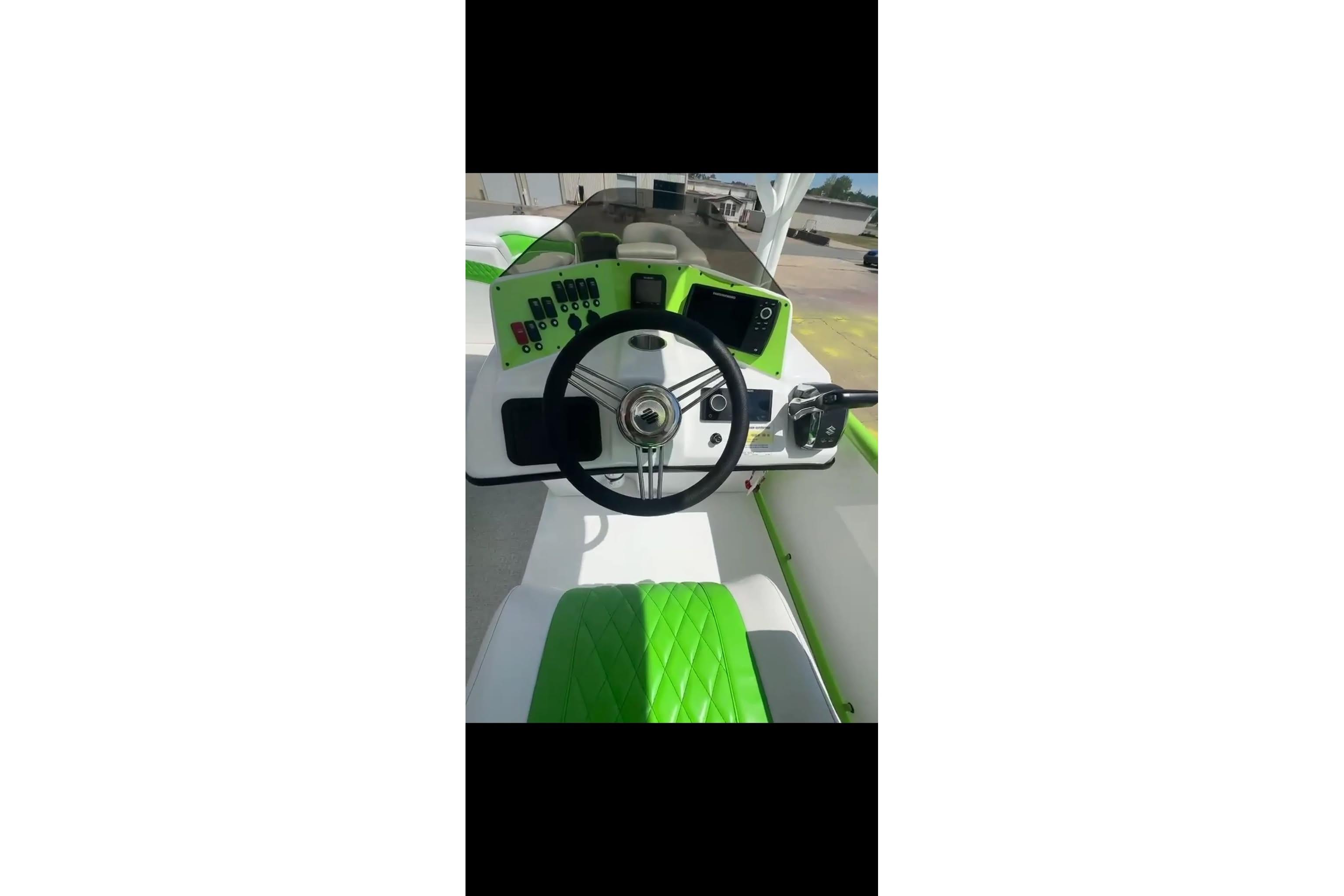 2026 Aloha Pontoon 300 dashboard with green accents and modern controls.