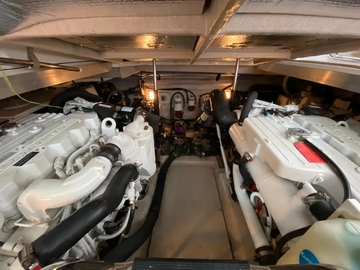 Equinox Yacht Photos Pics Engine room of a 2010 Sea Ray 470 Sundancer yacht with twin engines.