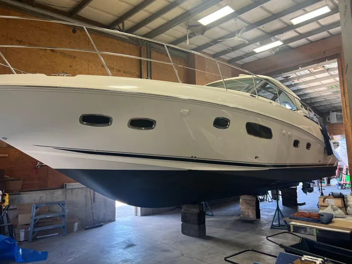 Equinox Yacht Photos Pics 2010 Sea Ray 470 Sundancer yacht in a boatyard for maintenance.