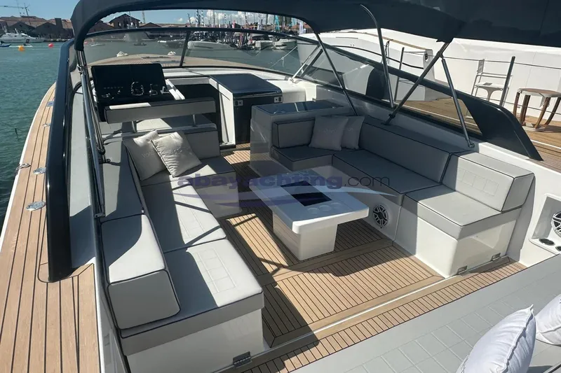  Yacht Photos Pics 2024 VanDutch 48 yacht interior with sleek seating and modern design.