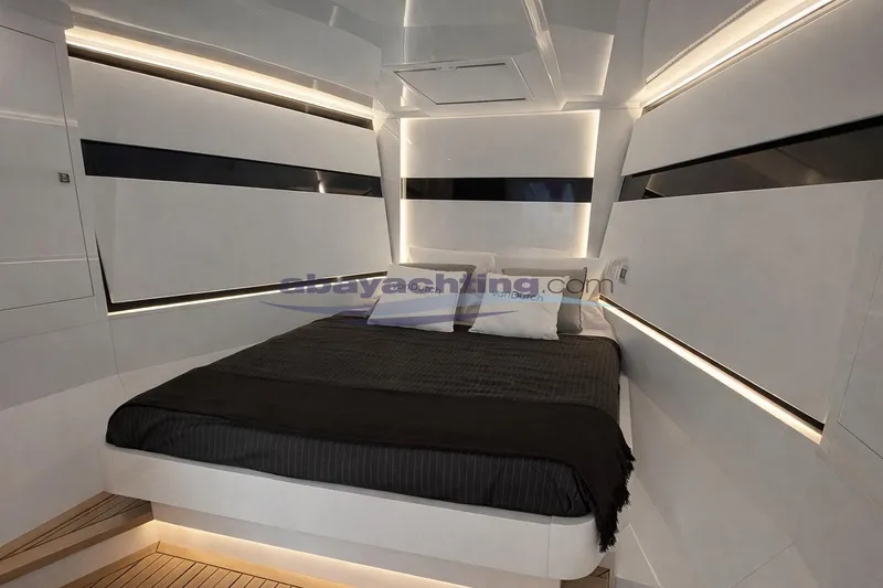  Yacht Photos Pics Luxurious interior cabin of 2024 VanDutch 48 yacht with modern design and ambient lighting.