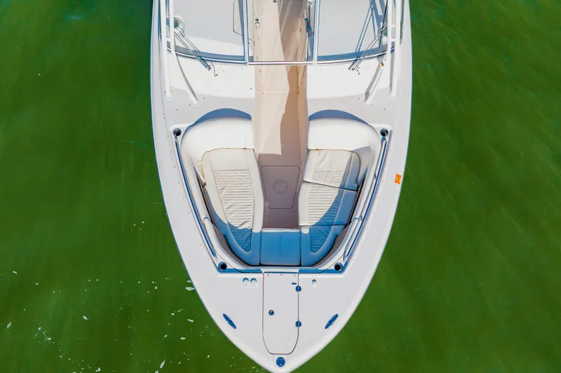 Yacht Photos Pics Aerial view of 2013 Grady-White Freedom 335 boat on green water.