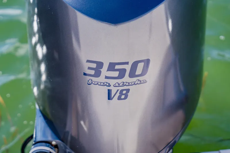  Yacht Photos Pics Outboard motor with "350 four stroke V8" label on Grady-White Freedom 335, 2013 model.
