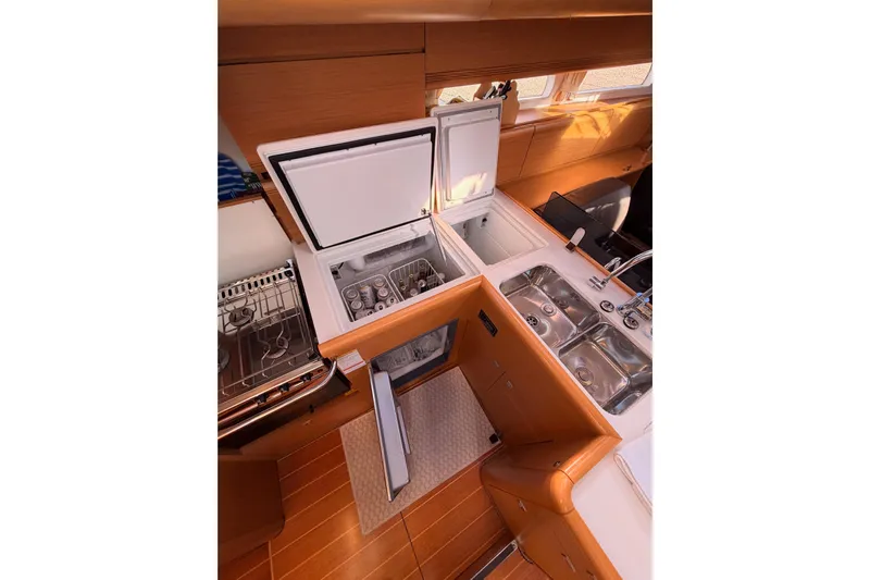 Joie Yacht Photos Pics Luxurious 2011 Jeanneau 53 yacht kitchen with modern appliances and sleek design.