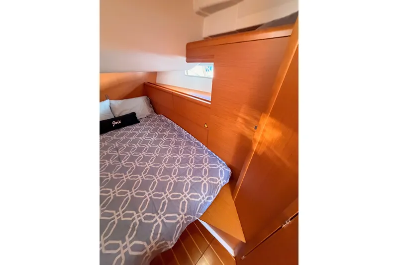 Joie Yacht Photos Pics Cozy cabin interior of 2011 Jeanneau 53 yacht with patterned bedding.