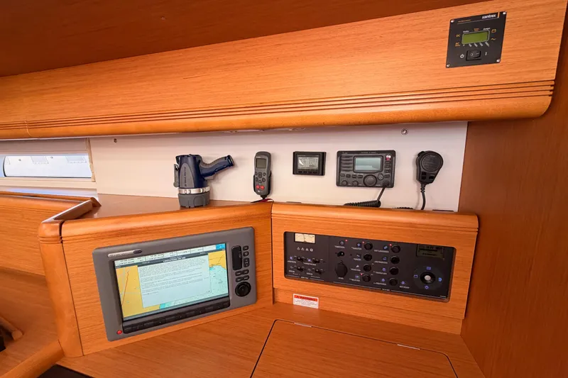 Joie Yacht Photos Pics Interior of 2011 Jeanneau 53 yacht with navigation and communication equipment.