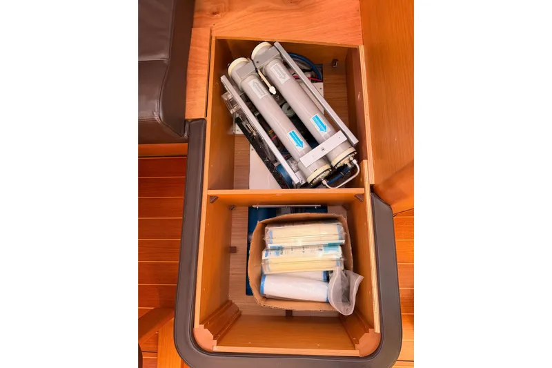 Joie Yacht Photos Pics Storage compartment on 2011 Jeanneau 53 yacht with equipment and supplies.