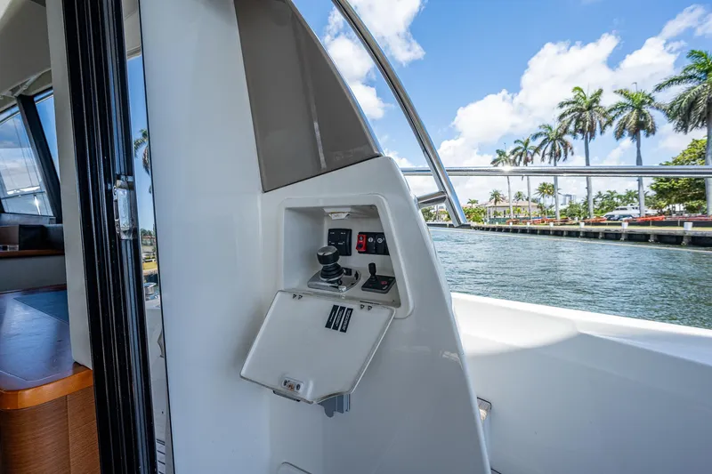  Yacht Photos Pics Prestige 550 yacht control panel with scenic waterfront view, 2014 model.