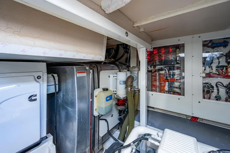  Yacht Photos Pics Engine room of 2014 Prestige 550 yacht with mechanical equipment and wiring.