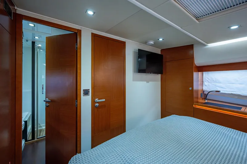  Yacht Photos Pics Luxurious cabin interior of 2014 Prestige 550 yacht with modern amenities.