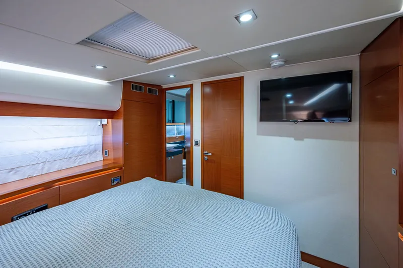  Yacht Photos Pics Luxurious cabin interior of 2014 Prestige 550 yacht with modern amenities.