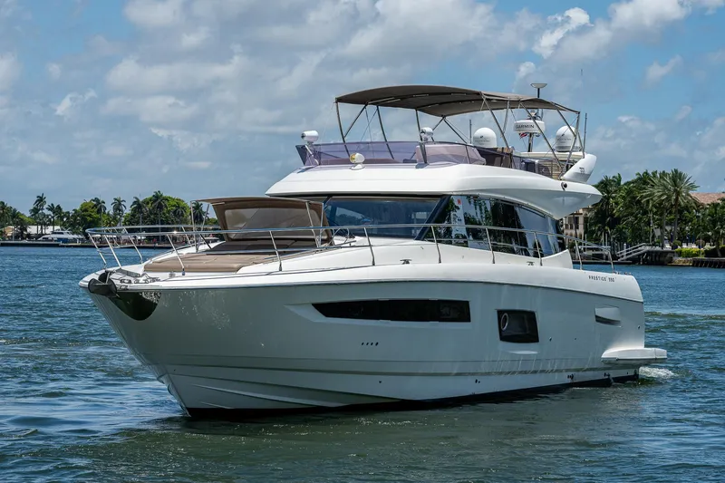  Yacht Photos Pics Luxury 2014 Prestige 550 yacht cruising on a sunny day.