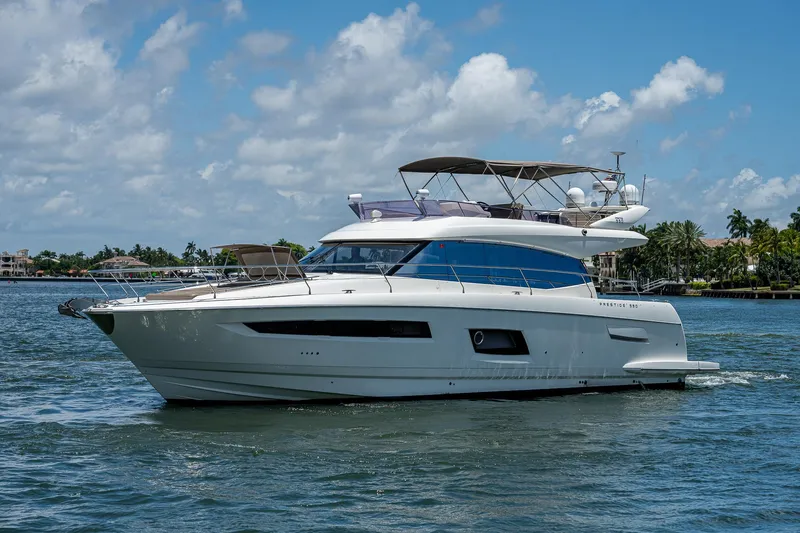  Yacht Photos Pics Luxury 2014 Prestige 550 yacht cruising on a sunny day.