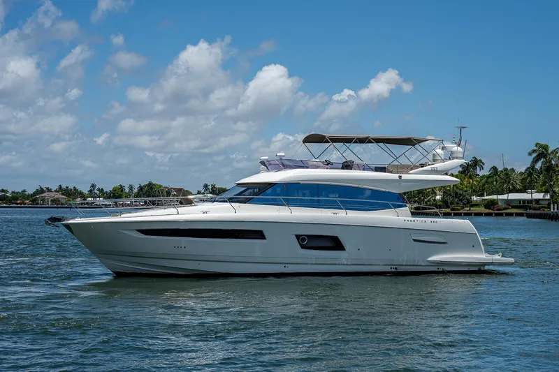  Yacht Photos Pics Luxury 2014 Prestige 550 yacht cruising on a sunny day.