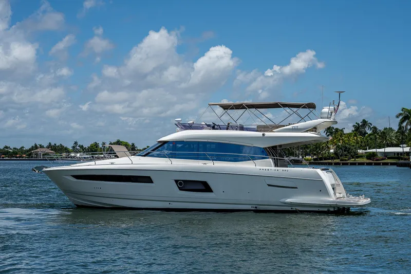  Yacht Photos Pics Luxury 2014 Prestige 550 yacht cruising on a sunny day.