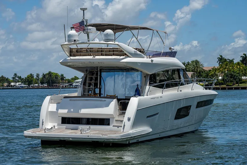  Yacht Photos Pics Luxury 2014 Prestige 550 yacht cruising on a sunny day.