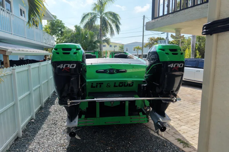  Yacht Photos Pics Green 2021 E-Ticket 29 boat with twin 400R engines, parked outdoors.