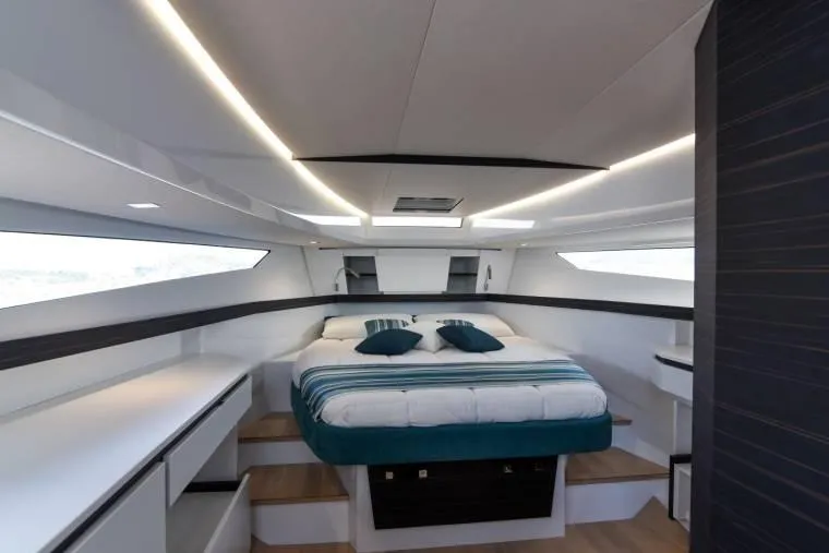 Yacht Photos Pics Luxurious interior of 2024 Fiart Seawalker 39 yacht with modern bedroom design.
