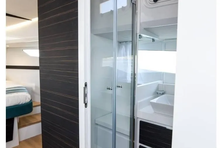  Yacht Photos Pics Interior of 2024 Fiart Seawalker 39 yacht, featuring modern bathroom and bedroom.