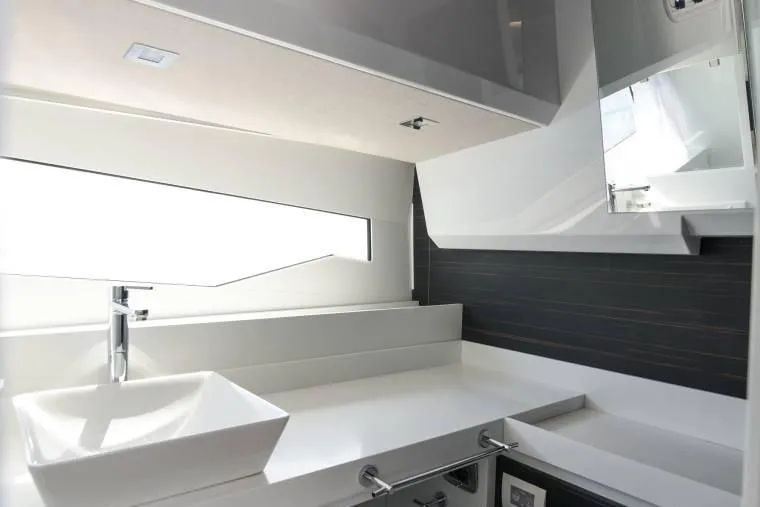  Yacht Photos Pics Modern bathroom interior of 2024 Fiart Seawalker 39 yacht, featuring sleek design and white fixtures.