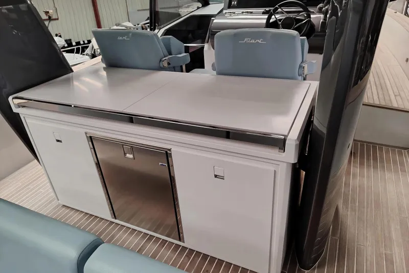  Yacht Photos Pics 2024 Fiart Seawalker 39 interior with sleek seating and modern console design.