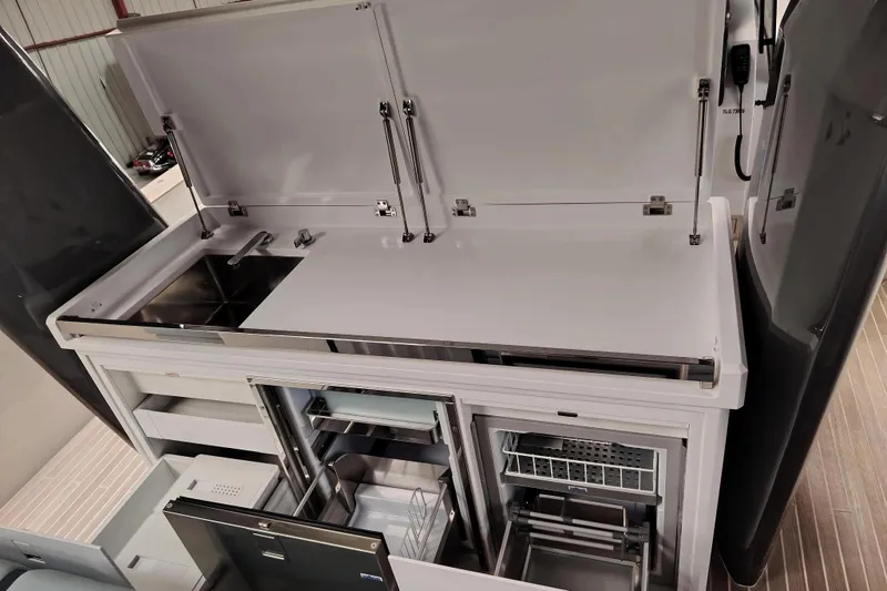  Yacht Photos Pics 2024 Fiart Seawalker 39 yacht kitchen with modern appliances and sleek design.