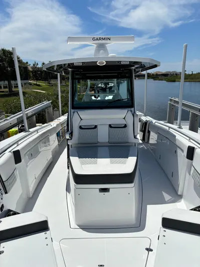  Yacht Photos Pics 2024 Blackfin 332 CC boat with sleek design, spacious deck, and modern features.
