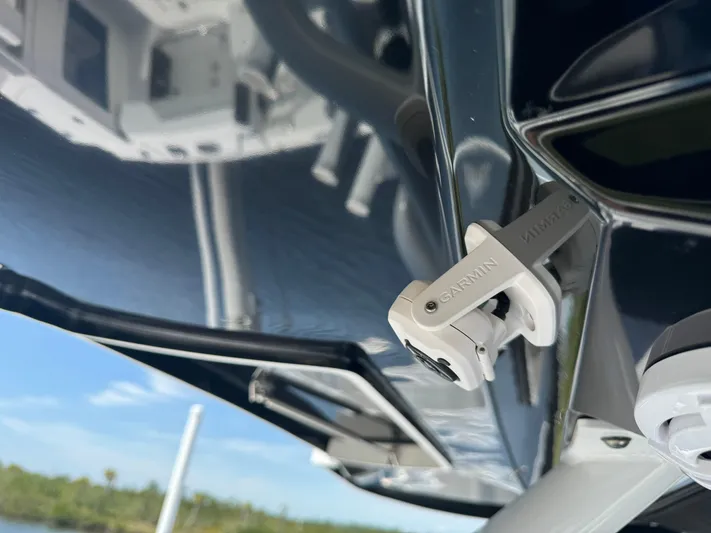  Yacht Photos Pics 2024 Blackfin 332 CC boat detail, featuring a Garmin mount under a sleek, reflective surface.