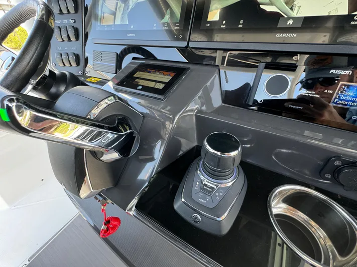  Yacht Photos Pics 2024 Blackfin 332 CC helm with advanced controls and navigation systems.