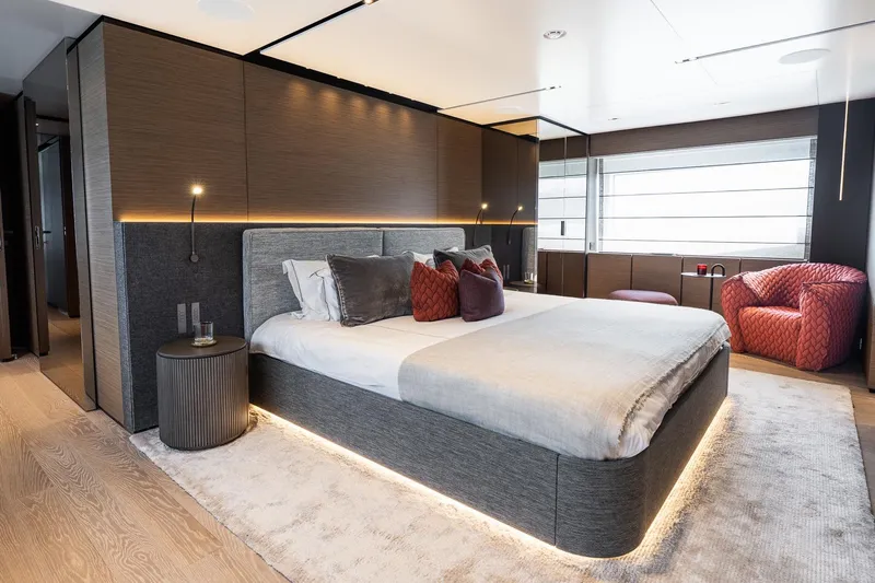 Queen J III Yacht Photos Pics Luxurious bedroom interior on 2024 Custom Line Navetta 33 yacht, featuring modern design and elegant furnishings.