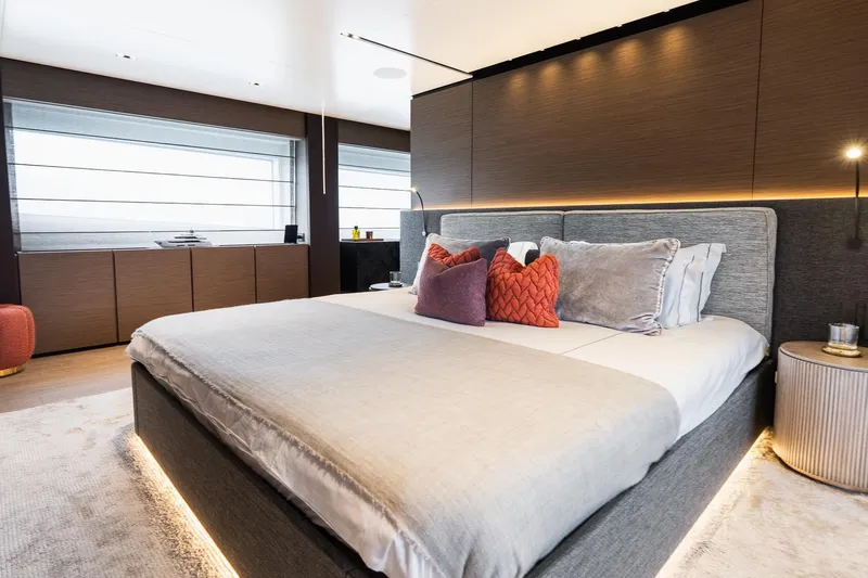 Queen J III Yacht Photos Pics Luxurious bedroom interior of 2024 Custom Line Navetta 33 yacht, featuring elegant design.