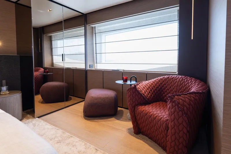 Queen J III Yacht Photos Pics Luxurious interior of 2024 Custom Line Navetta 33 yacht with plush seating and modern decor.