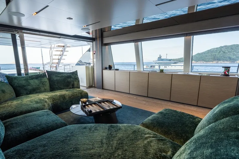 Queen J III Yacht Photos Pics Luxurious interior of 2024 Custom Line Navetta 33 yacht with ocean view.