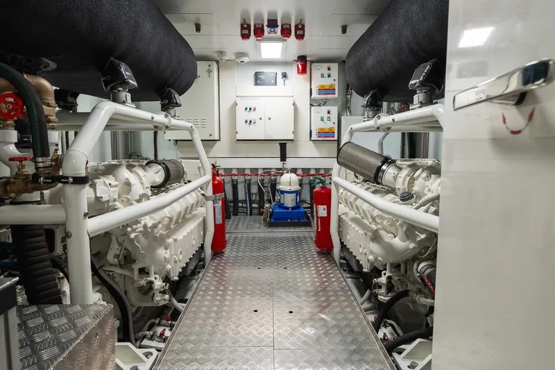 Queen J III Yacht Photos Pics Engine room of 2024 Custom Line Navetta 33 yacht, featuring advanced machinery and safety equipment.