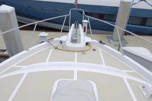 Ms Mickey Yacht Photos Pics Bow view of 1998 Ocean Alexander Yachtfish Command Bridge at dock.