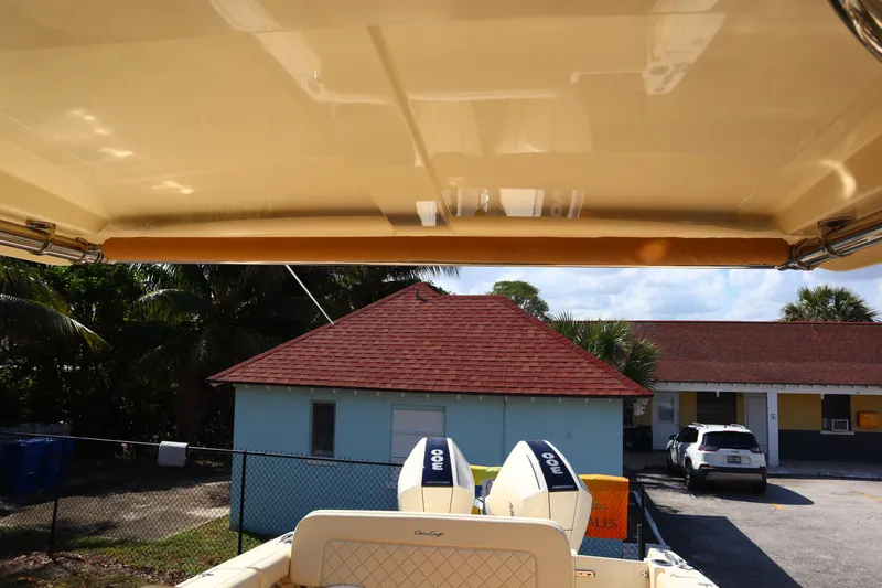  Yacht Photos Pics 2020 Chris-Craft Calypso 30 boat with dual engines, viewed from under canopy.