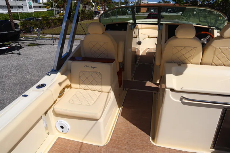  Yacht Photos Pics 2020 Chris-Craft Calypso 30 interior with beige seating and elegant design.
