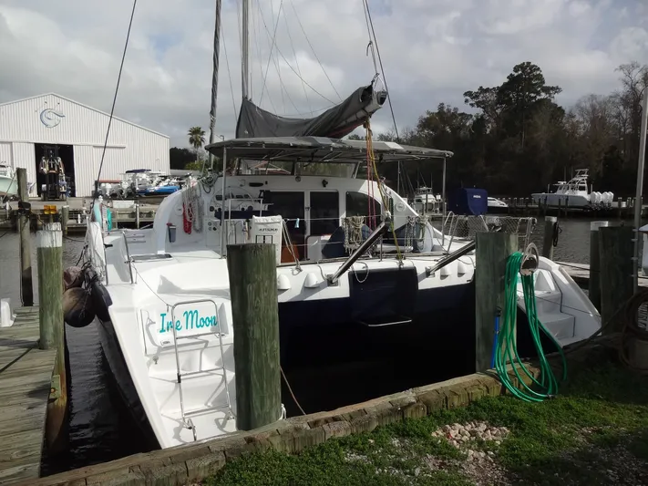 Cajun Moon Yacht Photos Pics 2003 Lagoon 410 catamaran docked at marina.
