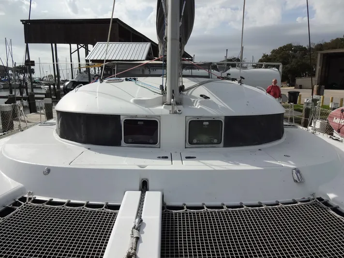 Cajun Moon Yacht Photos Pics 2003 Lagoon 410 catamaran docked at marina.