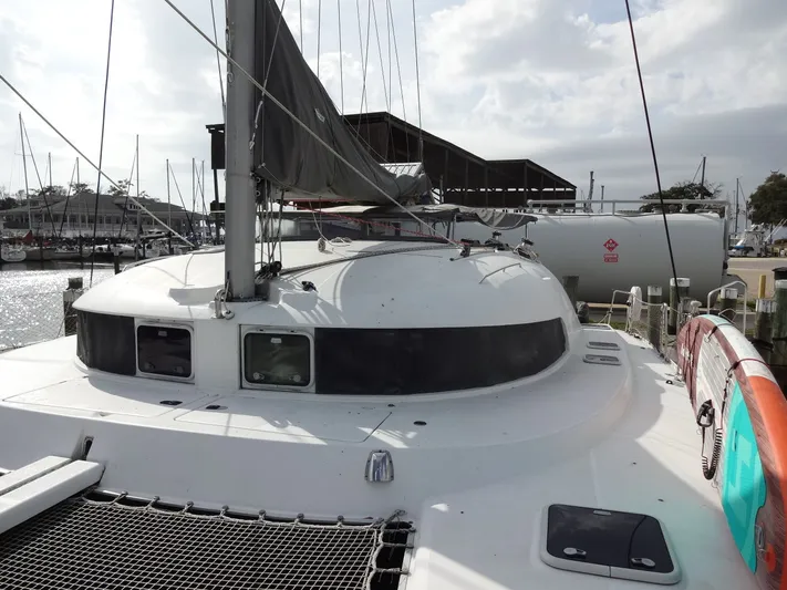 Cajun Moon Yacht Photos Pics 2003 Lagoon 410 catamaran docked at marina.